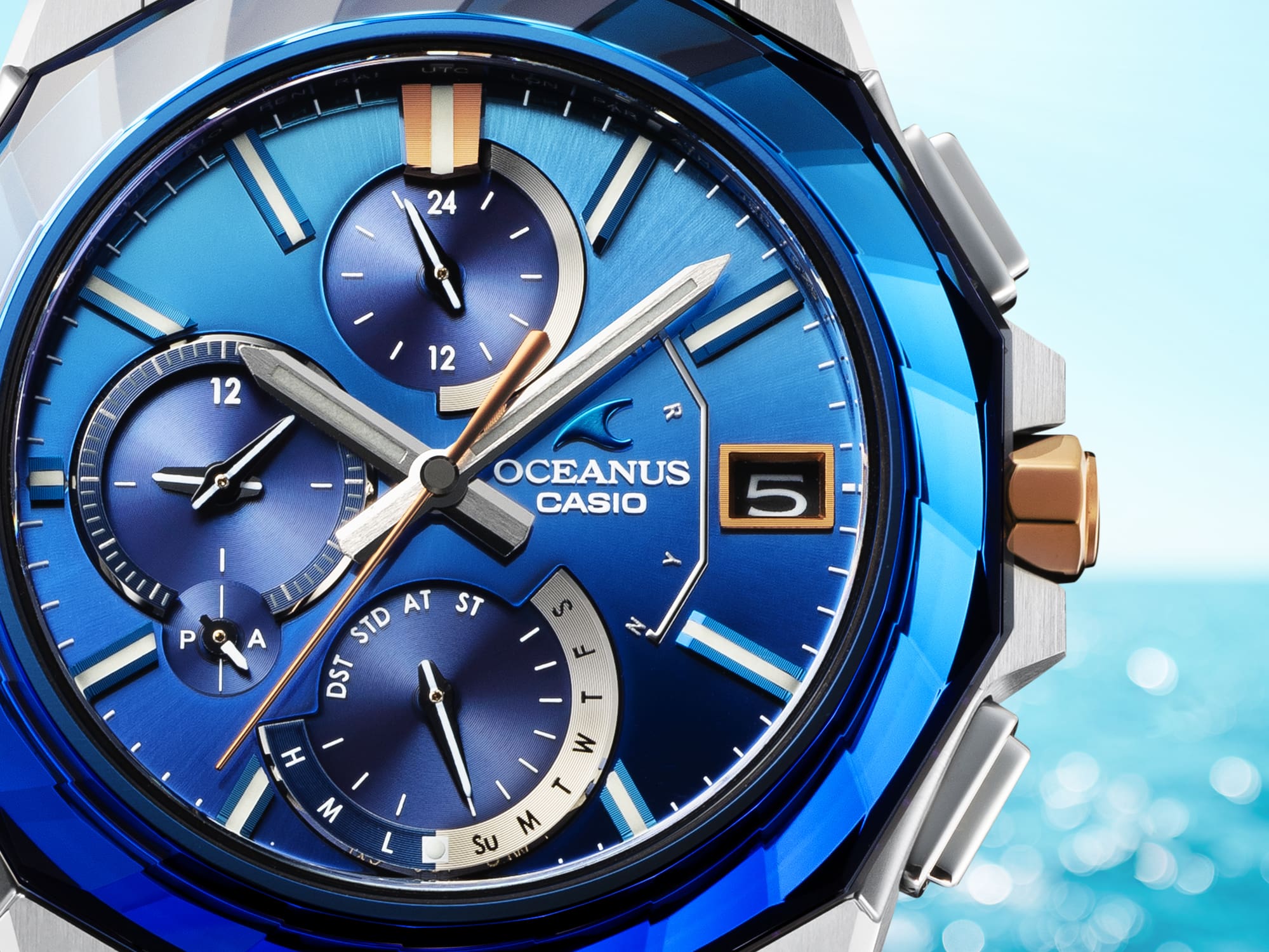 Close up of OCEANUS OCWS6000SW-2A Analog watch with blue face and bezel